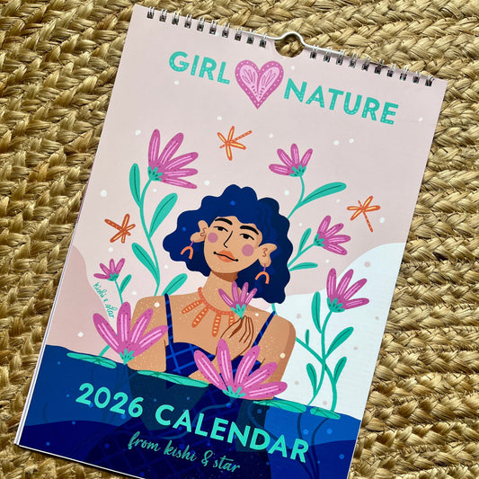 2026 calendar with a girl and nature design on a textured surface